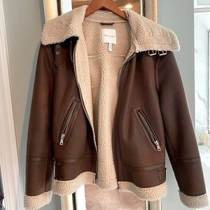 Faux leather fleece lined jacket, removable hood.